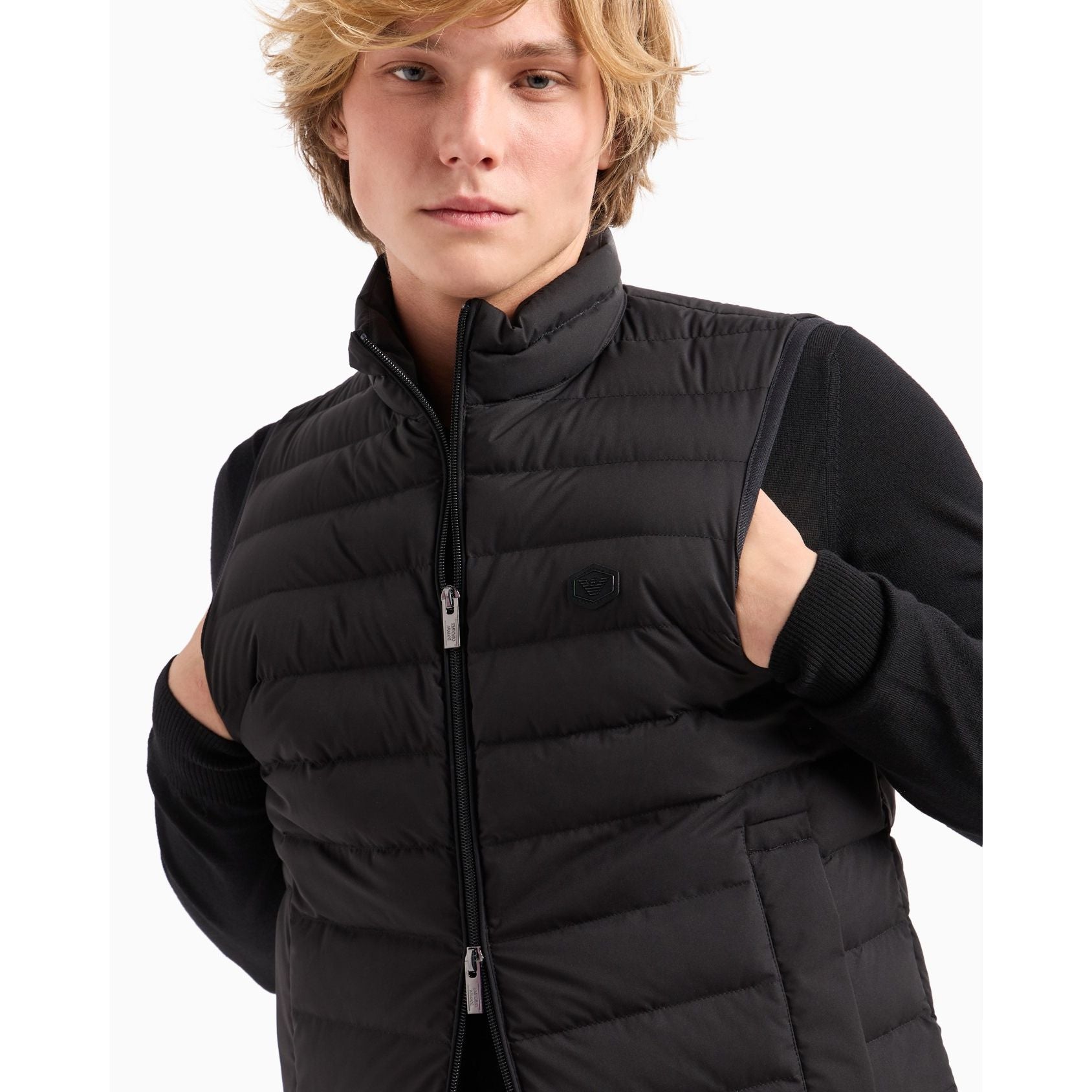 Sleeveless full-zip down jacket in quilted nylon with eagle logo patch